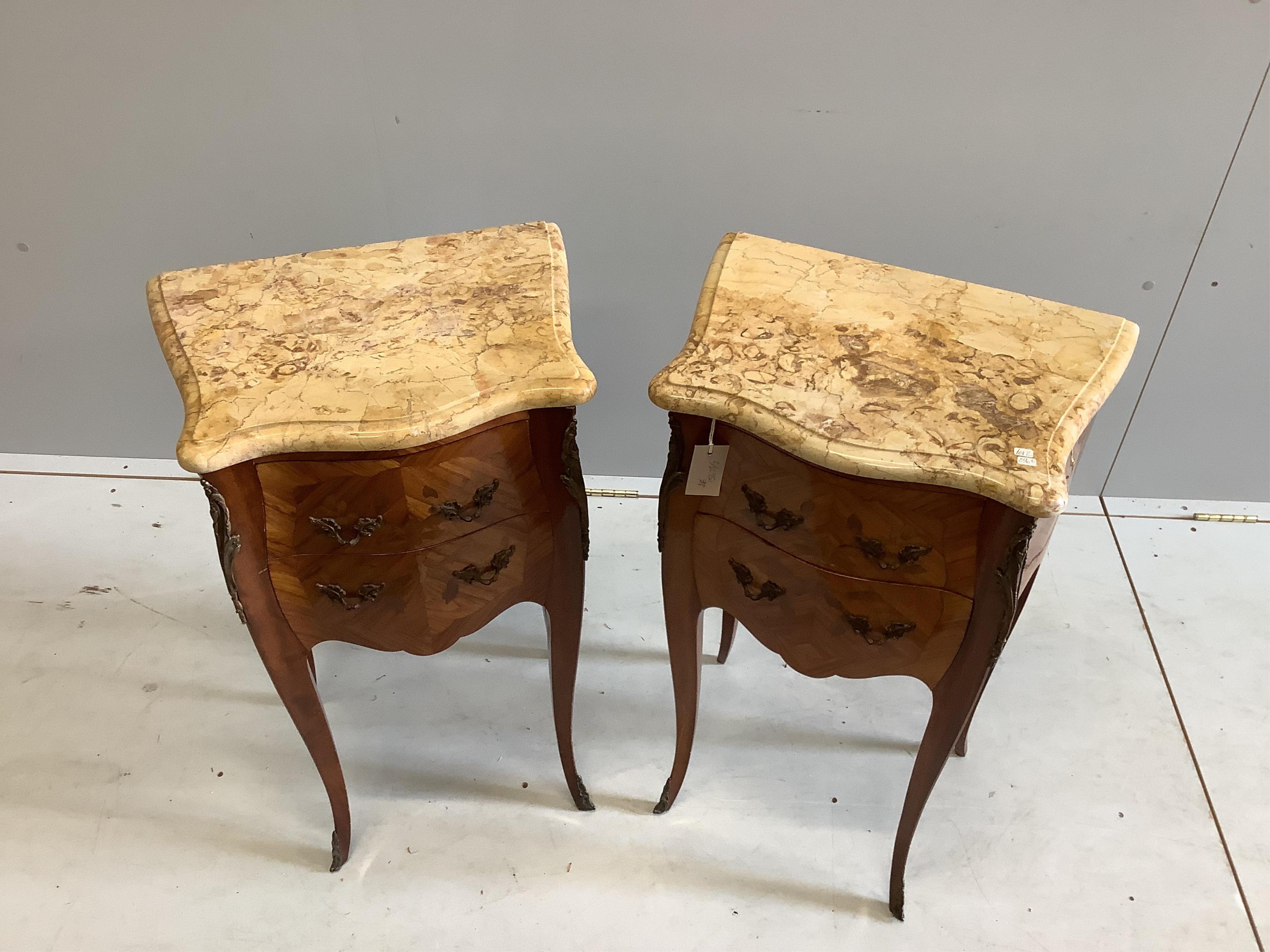 A pair of Louis XVI style marquetry inlaid gilt metal mounted kingwood marble top bedside cabinets, width 45cm, depth 32cm, height 75cm. Condition - good